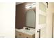 Bathroom featuring slat wall, updated vanity, mirror and sliding door at 4277 Rimcrest Rd, Las Vegas, NV 89121