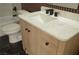 Modern bathroom with sleek vanity featuring marble countertop and black fixtures at 4277 Rimcrest Rd, Las Vegas, NV 89121