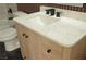Modern bathroom with sleek vanity featuring marble countertop and black fixtures at 4277 Rimcrest Rd, Las Vegas, NV 89121