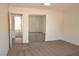 Bedroom with carpet, and mirrored closet doors at 4277 Rimcrest Rd, Las Vegas, NV 89121