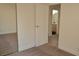 Bedroom featuring mirrored closet and a bathroom doorway at 4277 Rimcrest Rd, Las Vegas, NV 89121