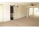 Main bedroom featuring sliding doors to the bath, closet, and carpeted floors at 4277 Rimcrest Rd, Las Vegas, NV 89121