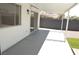 Covered outdoor patio area with sliding glass doors and a view of the backyard at 4277 Rimcrest Rd, Las Vegas, NV 89121