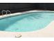 A close up of a sparkling blue swimming pool with a clean, white tile edge at 4277 Rimcrest Rd, Las Vegas, NV 89121