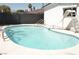 Inviting backyard pool features a slide, ladder, and clean, refreshing water at 4277 Rimcrest Rd, Las Vegas, NV 89121