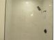 Modern bathroom shower with elegant marble-style tile and a sleek showerhead at 4277 Rimcrest Rd, Las Vegas, NV 89121