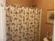 Bathroom shower with a themed shower curtain at 4620 Ventana Rey St, North Las Vegas, NV 89081