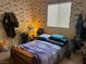 Bedroom with a bed, fan, and beige color scheme at 4620 Ventana Rey St, North Las Vegas, NV 89081