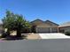 Charming single-story home with desert landscaping, and a convenient three-car garage at 4620 Ventana Rey St, North Las Vegas, NV 89081