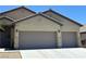 Well-kept home with a spacious three-car garage and attractive desert landscaping at 4620 Ventana Rey St, North Las Vegas, NV 89081