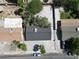 Aerial view of the home showcasing the roof, surrounding yards, and neighborhood at 4825 Stillwater Ave, Las Vegas, NV 89110