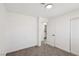 Clean bedroom showing an open door to a tiled bathroom at 4825 Stillwater Ave, Las Vegas, NV 89110