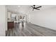 Open floorplan featuring the living room flowing to the kitchen area at 4825 Stillwater Ave, Las Vegas, NV 89110