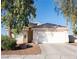 Charming single-story home with a well-maintained front yard and two-car garage at 4848 Cutting Diamond Ct, North Las Vegas, NV 89081