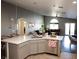 Modern kitchen with a large island, stainless steel appliances, and open layout at 4848 Cutting Diamond Ct, North Las Vegas, NV 89081