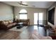 Comfortable living room featuring wood flooring, and natural light at 4848 Cutting Diamond Ct, North Las Vegas, NV 89081