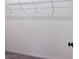 An empty closet with carpet and metal shelving at 4993 Birchland Manor Ave, Las Vegas, NV 89139