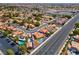Aerial view of a beautiful home with a sparkling pool, enclosed by a blue border at 5033 Austrian Dr, Las Vegas, NV 89130