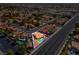 Aerial shot of a neighborhood with a blue outline highlighting the property with a pool at 5033 Austrian Dr, Las Vegas, NV 89130