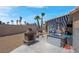 Outdoor living space with a patio, fire pit, grill, and lounge area at 5033 Austrian Dr, Las Vegas, NV 89130
