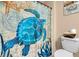 Bathroom showing a shower curtain with sea creatures, a toilet, and vanity details at 5033 Austrian Dr, Las Vegas, NV 89130