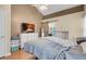 Bedroom featuring wood floors and natural light at 5033 Austrian Dr, Las Vegas, NV 89130
