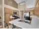 Well-lit kitchen features stainless steel appliances and eat in seating at the counter at 5033 Austrian Dr, Las Vegas, NV 89130