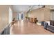 Spacious living room with hardwood floors and modern light fixture at 5033 Austrian Dr, Las Vegas, NV 89130