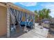 Outdoor patio featuring an overhang, outdoor furniture, and a barbecue grill at 5033 Austrian Dr, Las Vegas, NV 89130