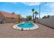 Private in-ground swimming pool with desert landscaping and exterior lighting at 5033 Austrian Dr, Las Vegas, NV 89130