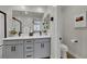 Modern bathroom features a double sink vanity, walk-in shower, and neutral color palette at 530 Sonoma Range St, Las Vegas, NV 89138