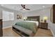 Comfortable bedroom with a large bed and neutral décor at 530 Sonoma Range St, Las Vegas, NV 89138