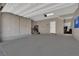 Spacious two-car garage with ample room for vehicles and storage, featuring neutral gray walls and epoxy floors at 530 Sonoma Range St, Las Vegas, NV 89138