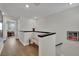 Bright hallway with wood floors and railing with modern decor accents at 530 Sonoma Range St, Las Vegas, NV 89138