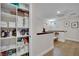 Hallway featuring organized linen closet with lots of towels, cleaning supplies, and essential storage solutions at 530 Sonoma Range St, Las Vegas, NV 89138