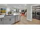 Modern kitchen open to the living area with stainless steel appliances at 530 Sonoma Range St, Las Vegas, NV 89138