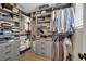 This walk-in closet provides ample storage with custom shelving and drawers at 530 Sonoma Range St, Las Vegas, NV 89138