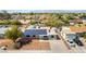 Aerial view of home, highlighting the driveway and solar panels on the roof at 5800 Auborn Ave, Las Vegas, NV 89108