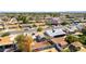 Overhead view captures the home and neighborhood with city views in the distance at 5800 Auborn Ave, Las Vegas, NV 89108