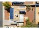 Aerial view of the home's roof, with solar panels, an air conditioner, and gravel landscaping at 5800 Auborn Ave, Las Vegas, NV 89108