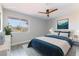 Calm bedroom with a large window, soothing decor, and soft natural light create a cozy retreat at 5800 Auborn Ave, Las Vegas, NV 89108