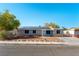 Charming single-story home with solar panels, mature trees, and a well-maintained front yard at 5800 Auborn Ave, Las Vegas, NV 89108