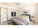 Relaxing bedroom featuring a cozy carpet, a double bed, and a closet at 5809 Pebble Beach Blvd, Las Vegas, NV 89108