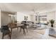 Cozy open-concept living room featuring sliding glass doors for seamless indoor-outdoor living at 5809 Pebble Beach Blvd, Las Vegas, NV 89108