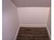 View of crawl space access panel in the wall with finished floors and baseboards at 6293 Pavestone Ln, Las Vegas, NV 89142