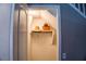 Attic storage space with shelving for personal items at 6293 Pavestone Ln, Las Vegas, NV 89142