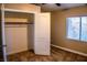 Cozy bedroom with a closet and a window allowing natural light to fill the space at 6293 Pavestone Ln, Las Vegas, NV 89142