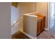 Upstairs hallway with built-in cabinets and carpet at 6293 Pavestone Ln, Las Vegas, NV 89142