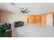 Open-concept living area featuring tile floors and ample natural light at 6602 Windy Palm St, North Las Vegas, NV 89086