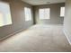 This carpeted, blank canvas bedroom is the perfect location for an owner to unwind and relax at 664 Forest Peak St, Henderson, NV 89011